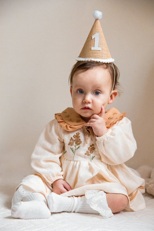 The First Birthday Outfit